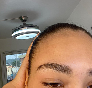 Reviewer's neat eyebrows after applying the clear gel