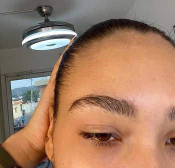 Reviewer's neat eyebrows after applying the clear gel
