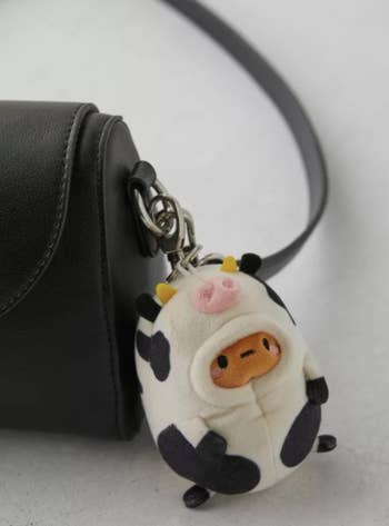 keychain clipped to a crossbody as a bag charm