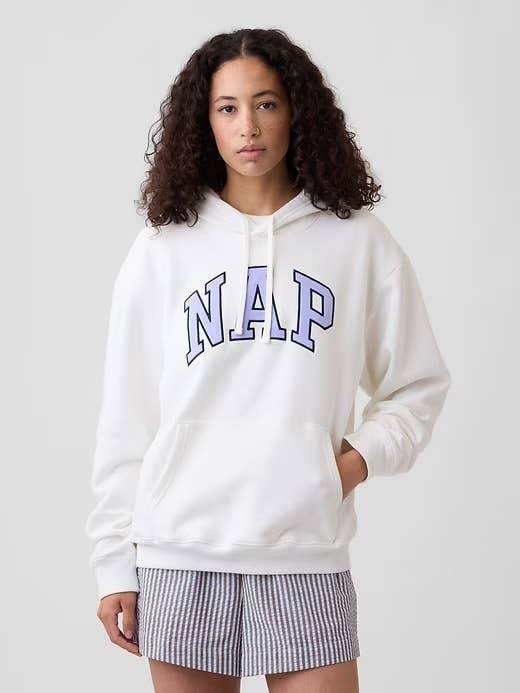 Person wearing a cozy hoodie with 