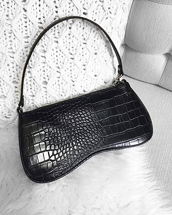 baguette shaped purse with faux croc finish
