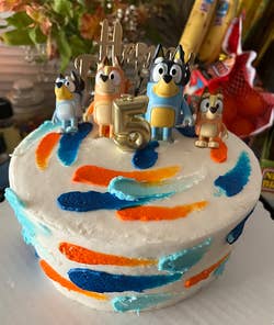 another reviewer's cake with the toys as toppers