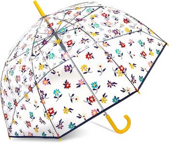 Clear umbrella with a colorful floral pattern and yellow handle