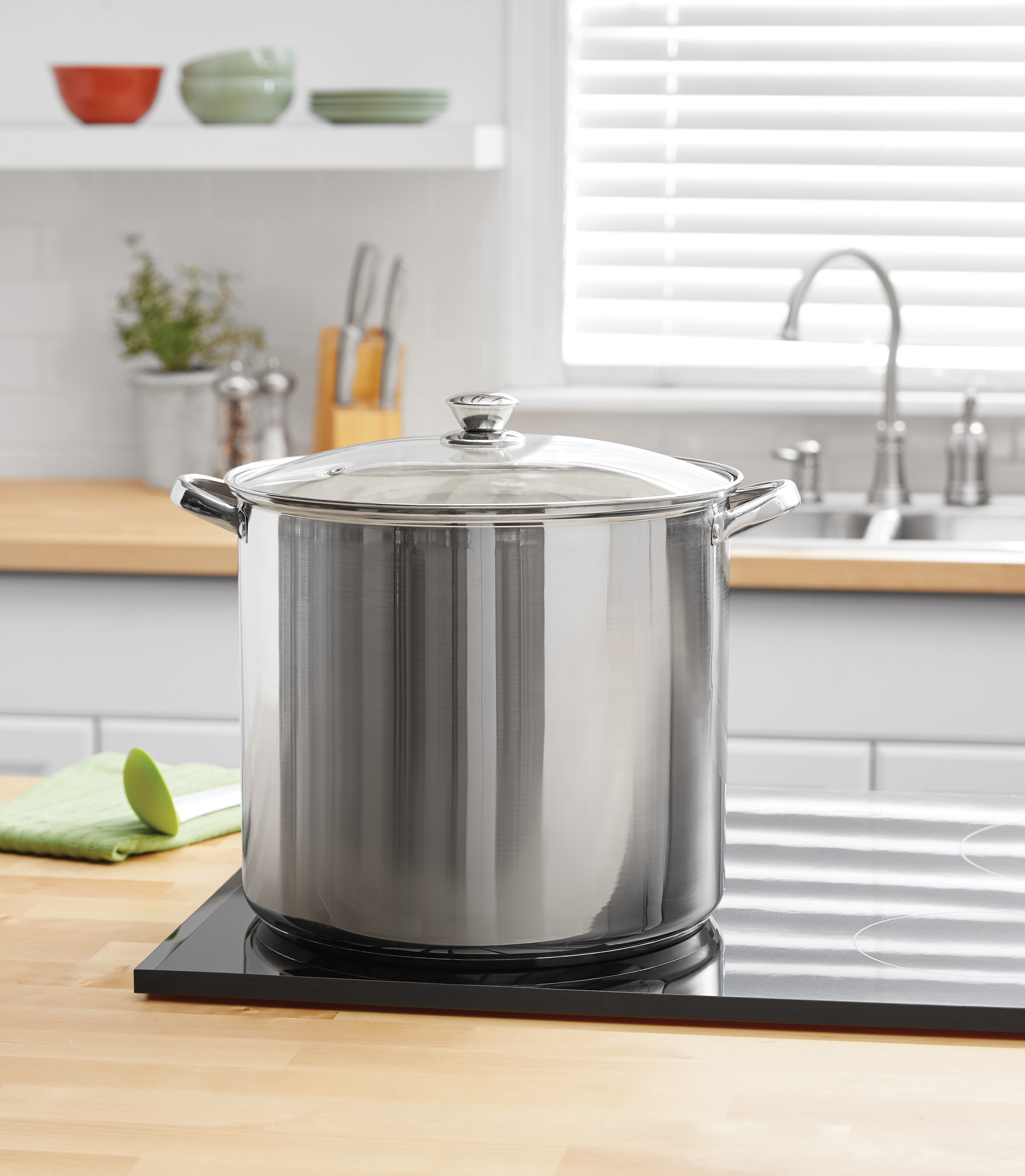 Silver pot with a transparent lid
