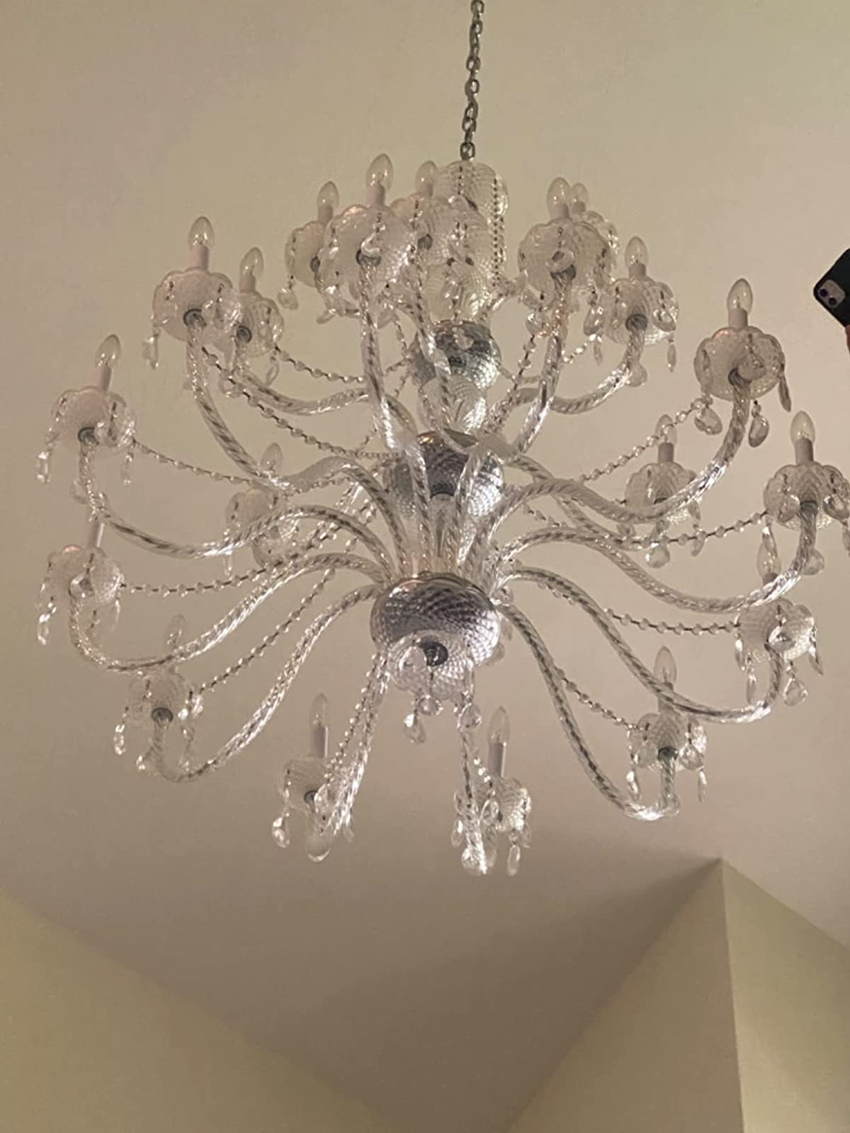 before photo of a reviewer's dingy chandelier