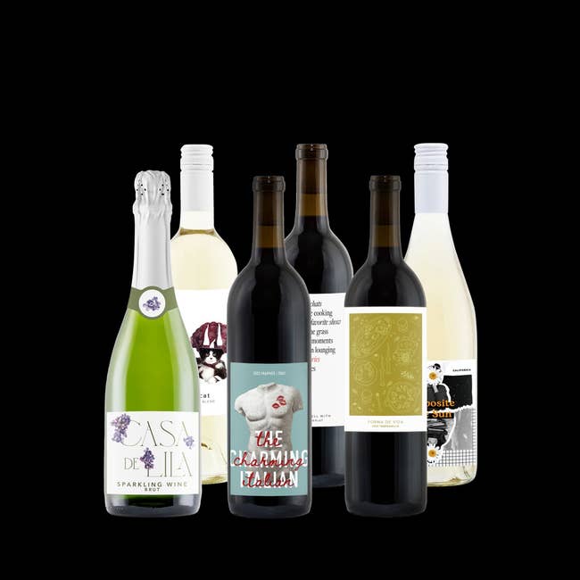 Six bottles of wine with unique labels, showcasing different designs and styles