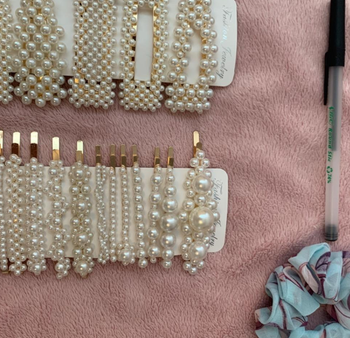 reviewer image of the 18 pearly hair clips