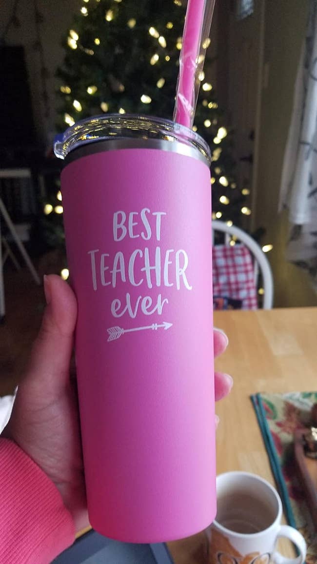 hot pink tumbler with straw that says 
