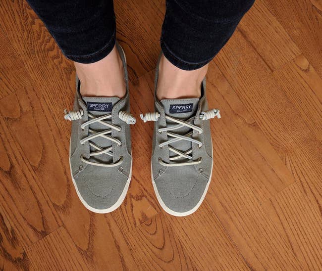 Reviewer photo of the grey Sperry sneakers