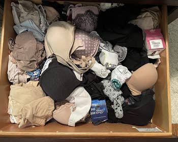 reviewer before photo of a very unorganized underwear drawer