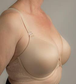 a side view of the beige bra