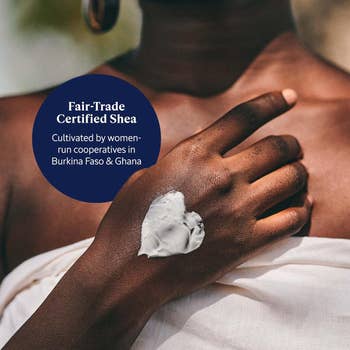 model's manus  with a bosom  shaped swatch of lotion and substance   