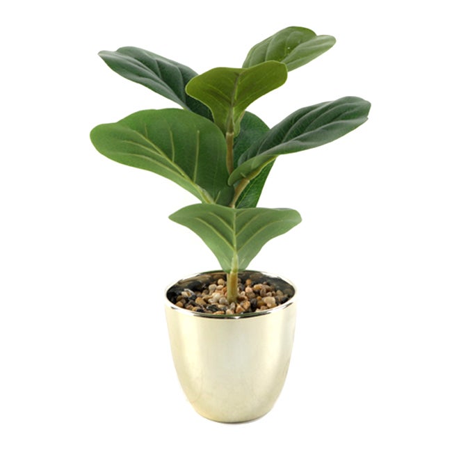 Decorative artificial plant in gold pot