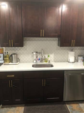 The reviewer's kitchen cabinets with the gold handles.