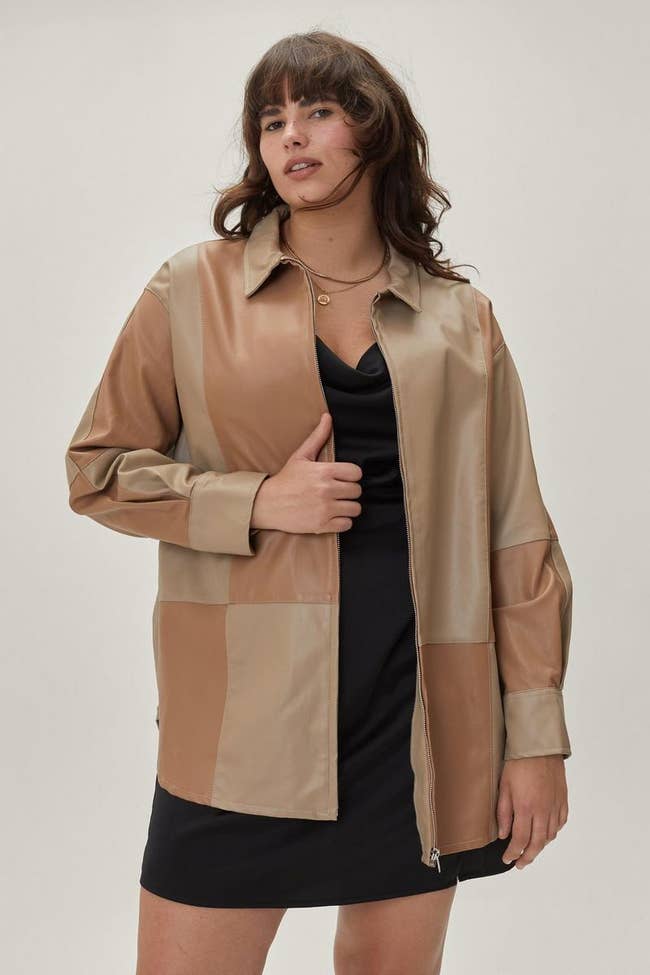 model wearing brown patchwork zipper jacket