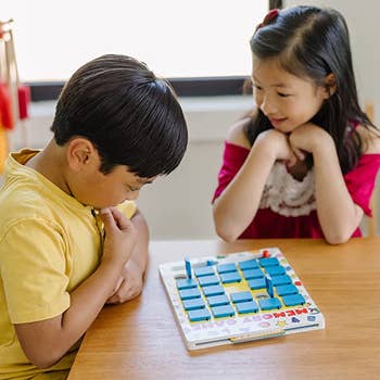 Two kids playing the game