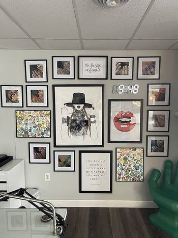 A reviewer's gallery wall with the clock added to it