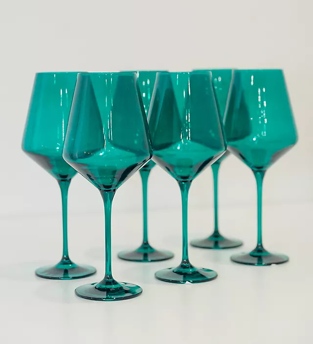 six green wine glasses