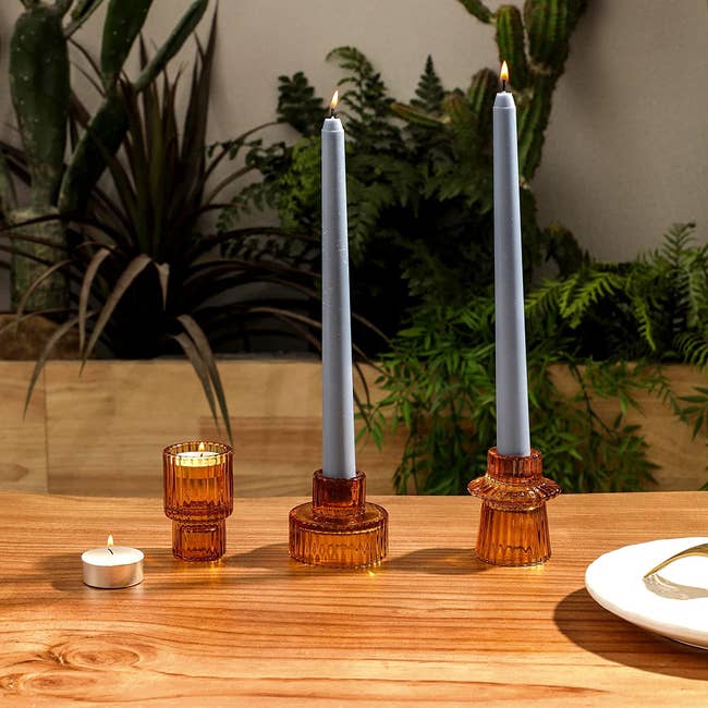 three of the amber candle holders
