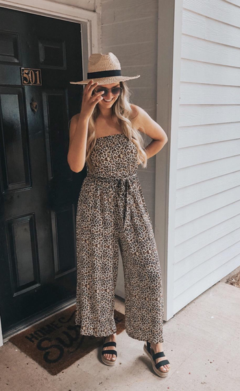 a different reviewer wearing the jumpsuit in leopard
