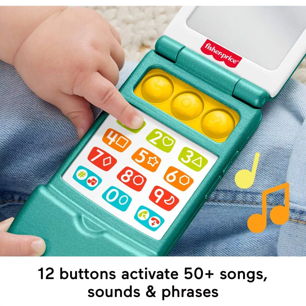 Child playing with Fisher-Price artifact  telephone  featuring buttons that activate songs, sounds, and phrases