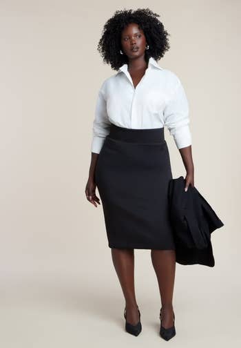 Person successful a achromatic garment and achromatic pencil skirt holding a jacket, styled for a nonrecreational look