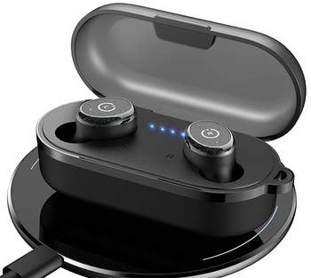 the black earbuds in their charging case