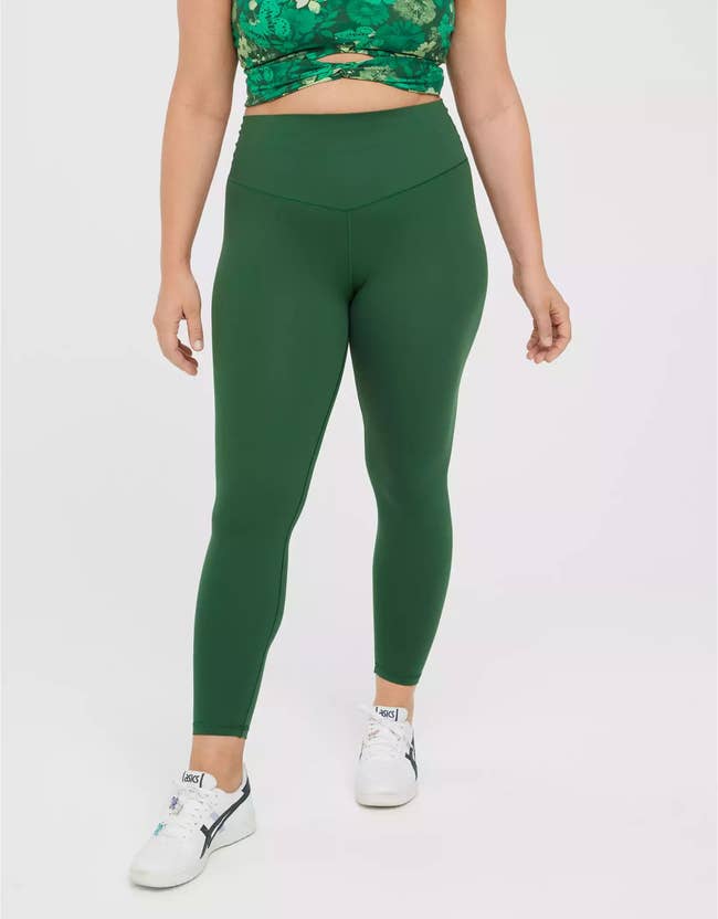 model wearing the leggings in green