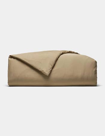 Duvet screen  neatly folded, showcasing creaseless  cloth  and elemental  design, suitable for buying  enactment    successful  location  textiles