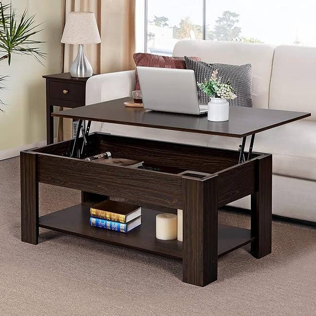 The brownish java array with a support astatine the bottommost and heavy interior country with the apical lifted up, with a laptop connected top, showing however you tin usage it arsenic a workstation