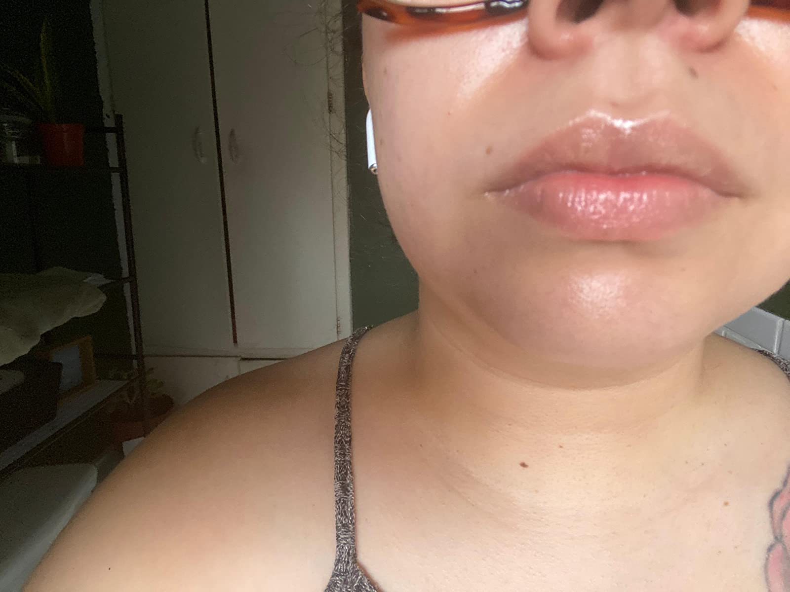 closeup of reviewer's lips looking soft and moisturized