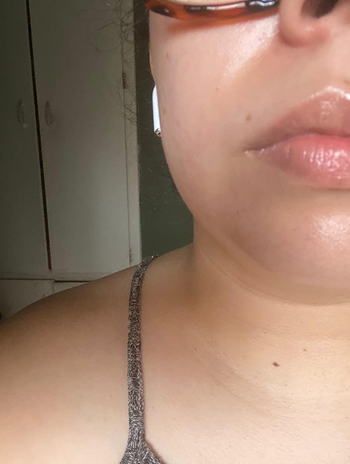 closeup of reviewer's lips looking soft and moisturized