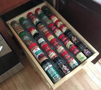 the spices looking organized in the drawer