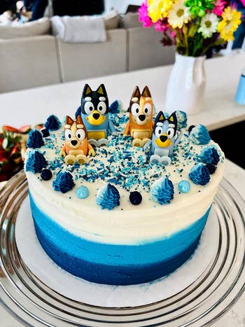 the bluey figures used as cake toppers