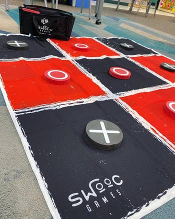 Large tic-tac-toe game with red and black squares