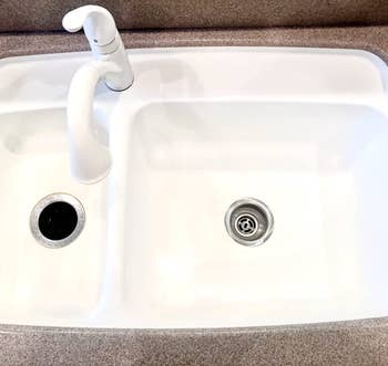 reviewer after photo of the same sink looking spotless after being treated with oxiclean
