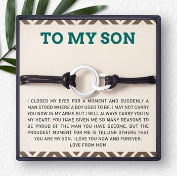 Sentimental bracelet with a heartfelt message from mother to son on a card