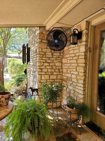 the fan hung in the corner of a reviewer's patio