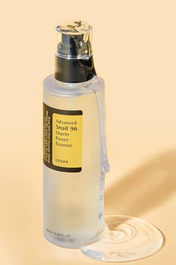 the bottle of snail mucin showing the thicker texture of the product