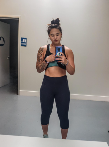 Reviewer is wearing the black leggings