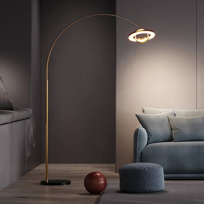 floor lamp with saturn LED light on the end