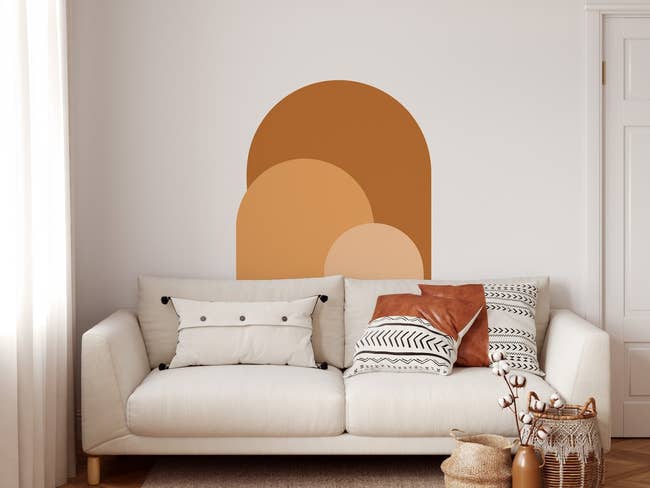 arch wall decal on wall in three shades of sunrise orange