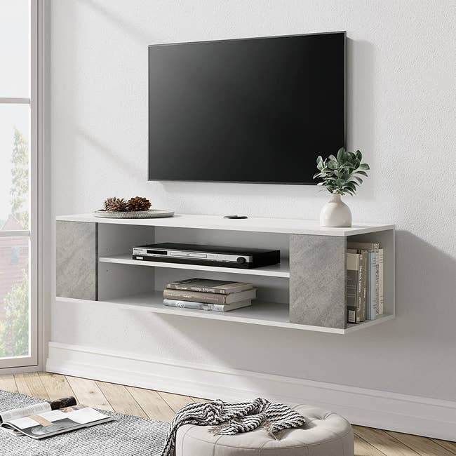 Image of white floating TV stand