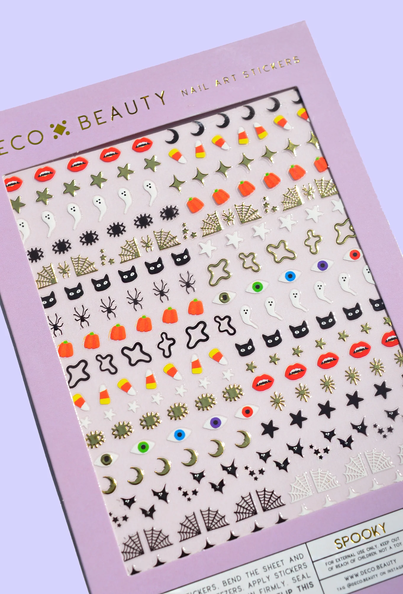 Halloween-themed nail creation  stickers with designs similar  ghosts, pumpkins, bats, bones, spiders, and candy corn