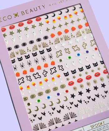 Halloween-themed nail creation stickers with designs similar ghosts, pumpkins, bats, bones, spiders, and candy corn
