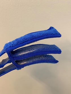 another reviewer's duster brush with the blue microfiber cloth