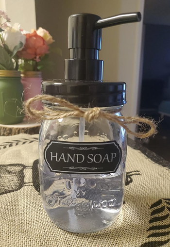 Reviewer image of hand soap dispenser with clear soap