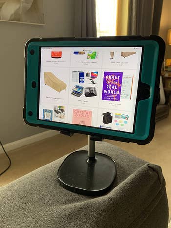 reviewer photo of iPad in stand