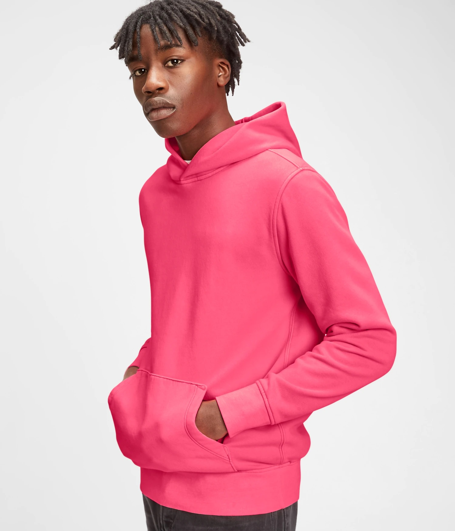 model wearing the hoodie in pink