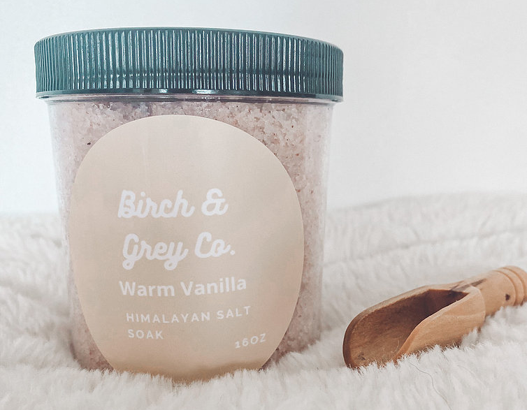Jar of pale pink bath soak